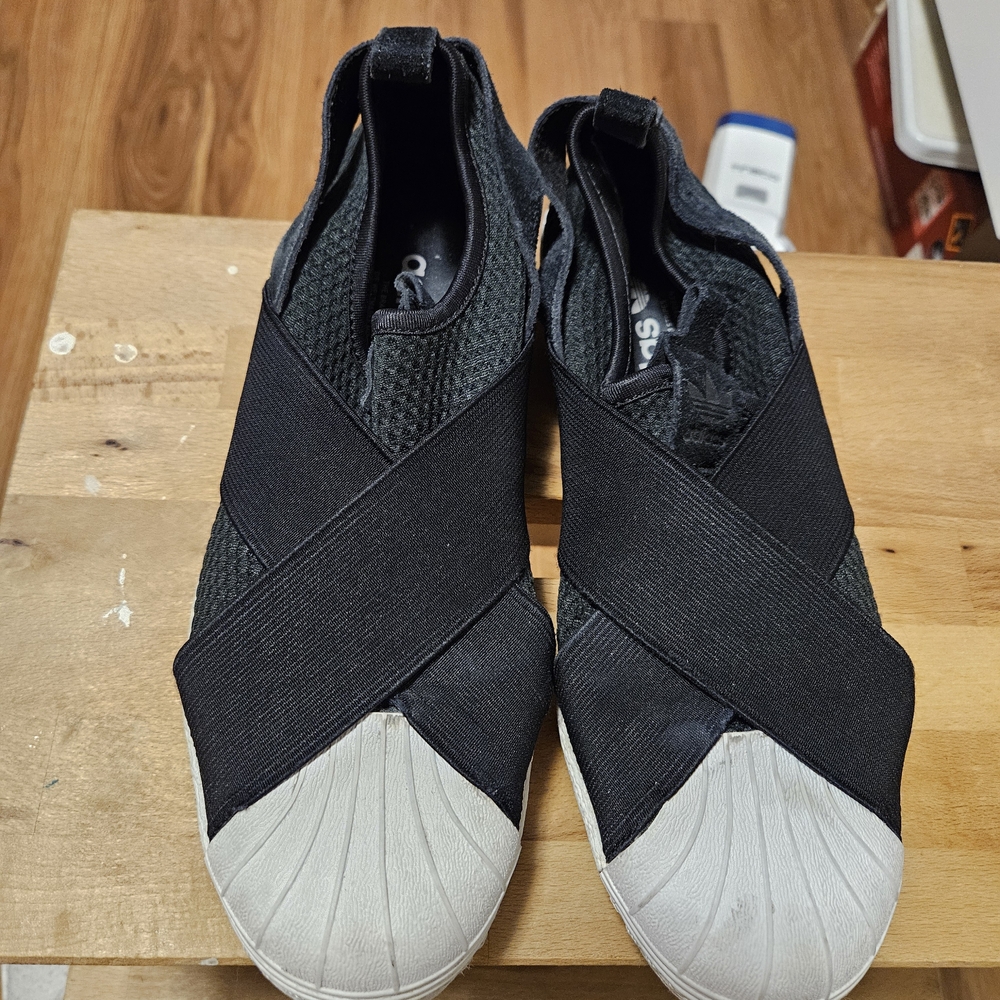 Adidas Black and White Slip-On Sneakers